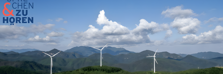 Eine Landschaft mit Windrädern