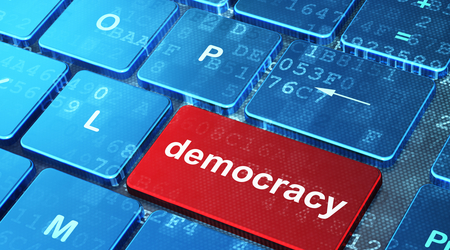 Political concept: Democracy on computer keyboard background