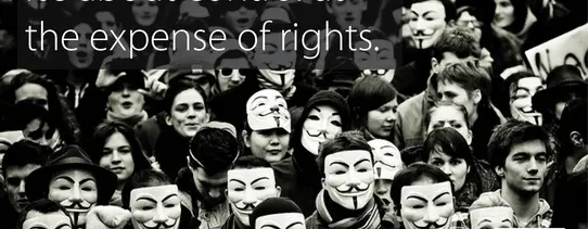ttip-einblick Auf dem Bild tragen fast alle Menschen eine Guy-Fawkes-Maske und oben links steht "TTIP isn't about trade. It's about control at the expense of rights.".