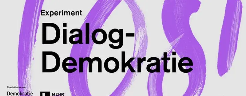 Auf dem Bild steht "Experiment Dialog-Demokratie."